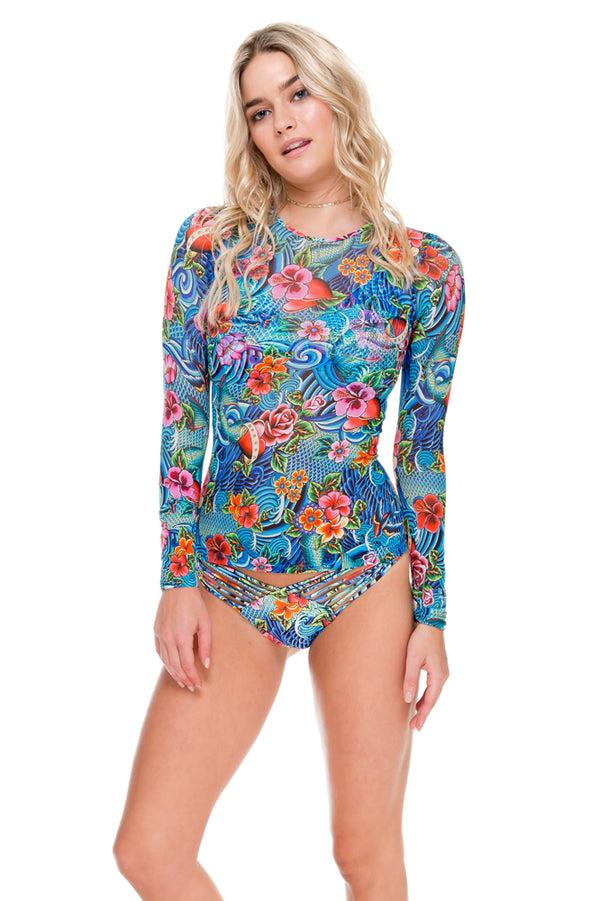 luli fama INKED BABE - Skin Deep Rash Guard & Strappy Brazilian Ruched Back Bott – Luli Fama